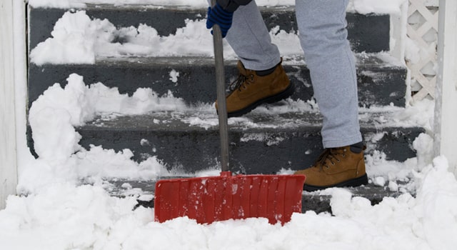 Person shoveling snow